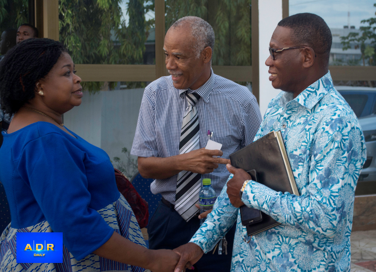 SILVIA ANNOH(left), LLOYD EVANS(middle), MR. PATRICE SEDDOH(right), interacting after the settlement