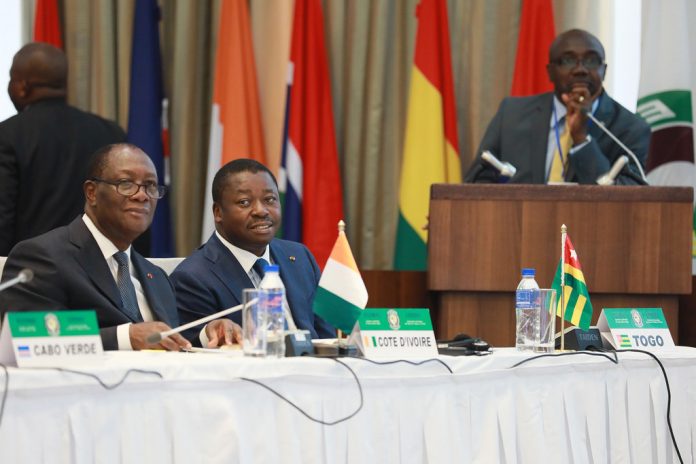 Togo's Gnassingbe and Guinea's Conde start Liberia mediation effort